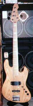 ash(or light ash) natural finished Jazz with 5 strings.