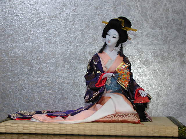 A woman of the Shogun's harem is relaxing.